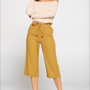 Yellow/gold linen Capri, elastic waist, lightweight, comes in small, medium, Lg